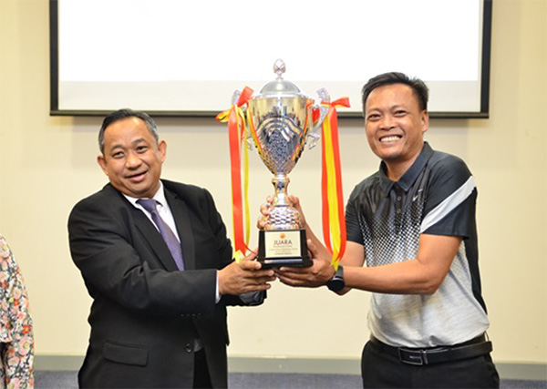 MINISTRY OF DEFENCE RECEIVES CHAMPIONSHIP TROPHY